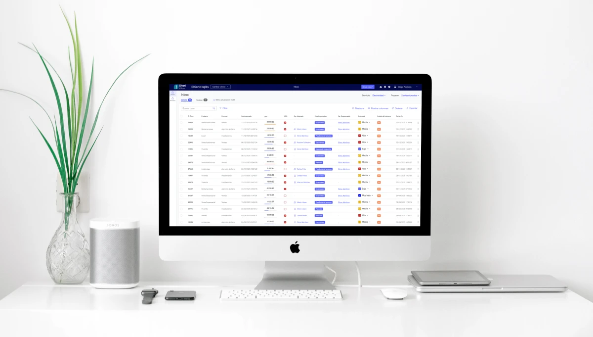 Shori task management interface shown on a desktop iMac — Inbox view listing BPO service tasks with status filters and multi-column data table