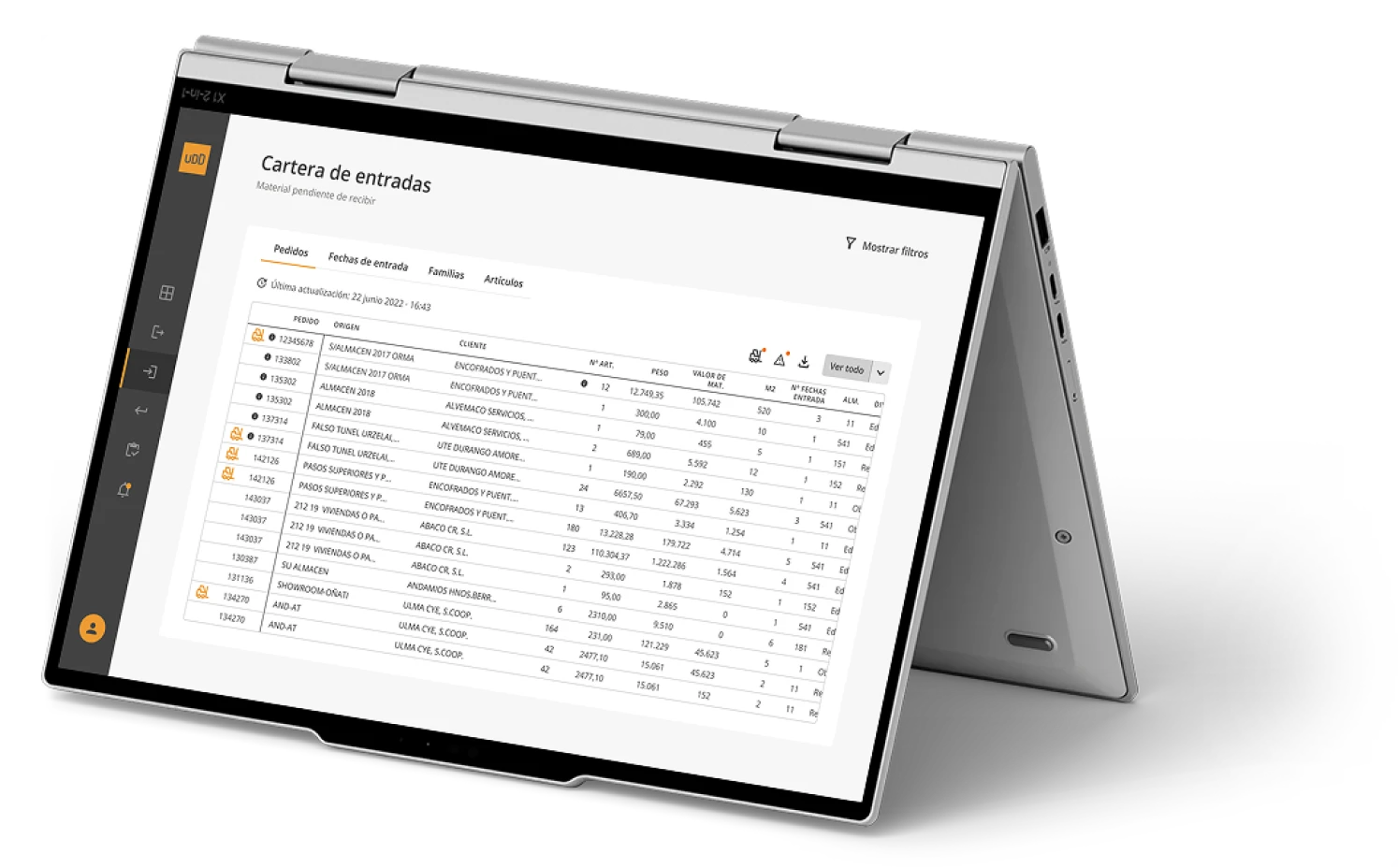 ULMA demand planning platform shown on a laptop in tent mode, displaying the main demand management dashboard